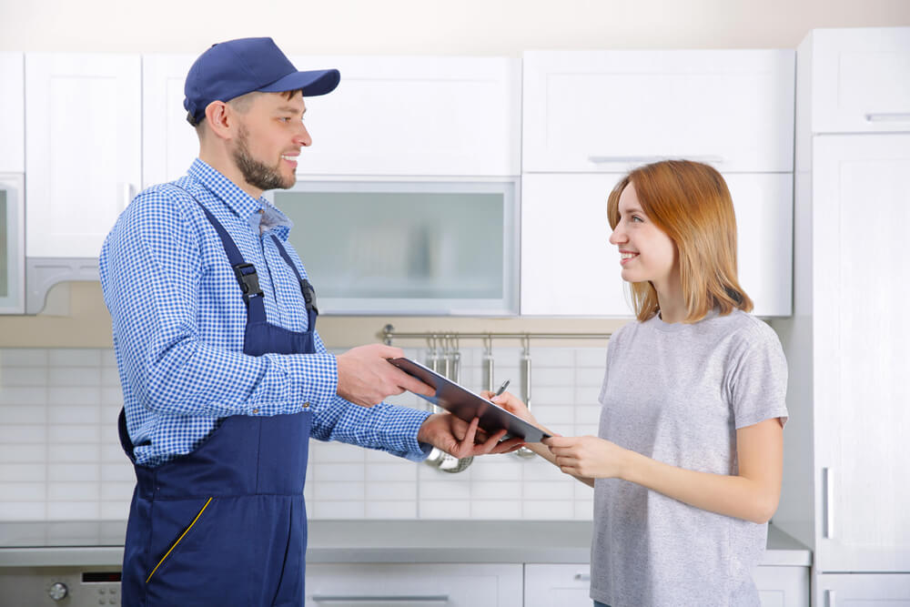 All Island Comfort technician meeting with a homeowner