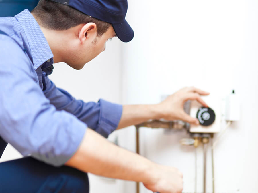 Long Island emergency heating system repair technician at work